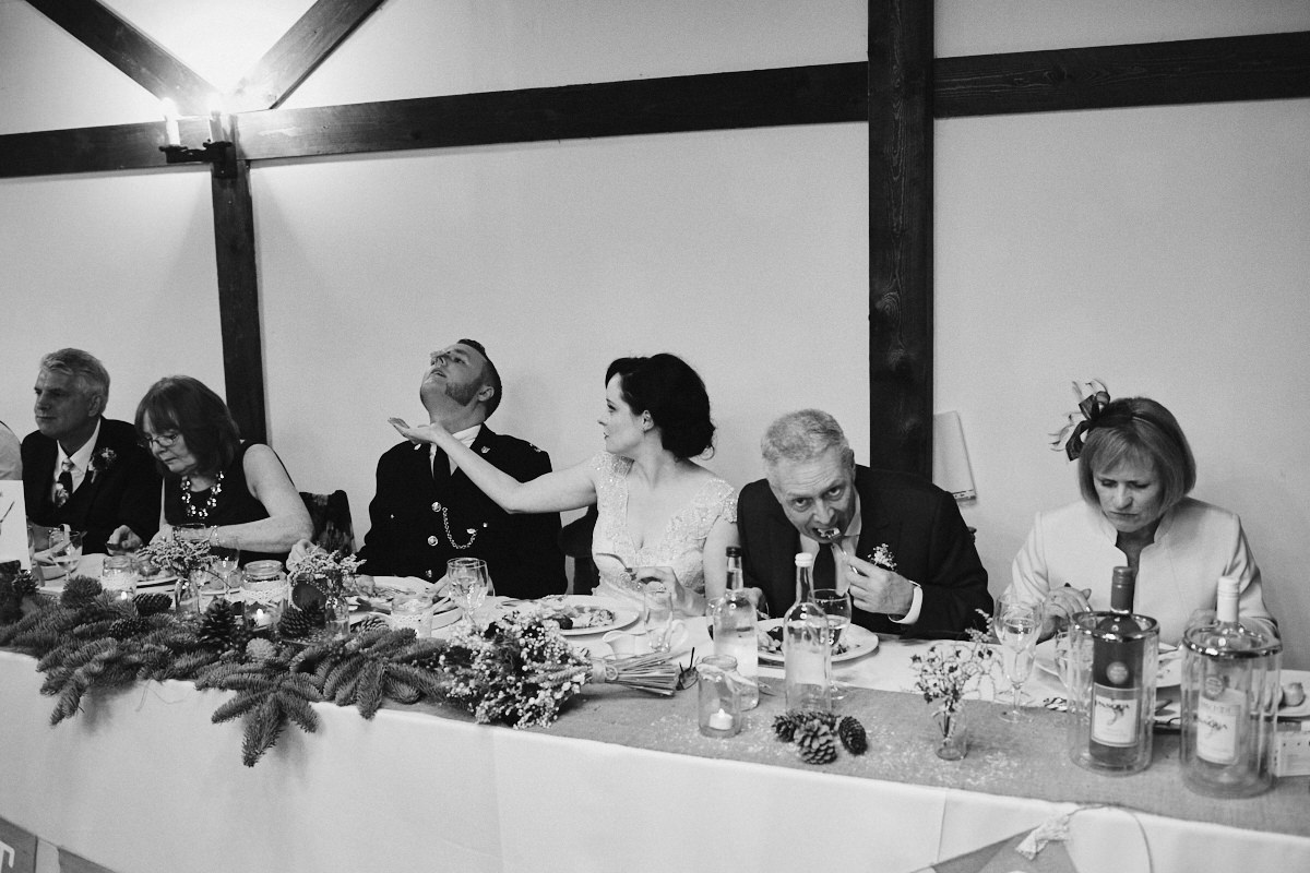 Funny wedding photo of a wedding top table at Blackstock Country Estate